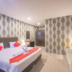 Апартаменты Grande Elegance Serviced Apartment комната для гостей фото 6