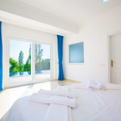 Villa Pinarbasi by Akdenizvillam Турция, Патара - отзывы, цены и фото номеров - забронировать отель Villa Pinarbasi by Akdenizvillam онлайн комната для гостей фото 3