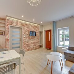 Апартаменты Lion Apartments - Haffnera 19 Сопот комната для гостей