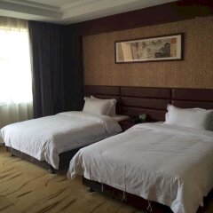 Shengshi Holiday Hotel комната для гостей фото 4