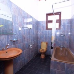 Отель The Blue Beach Guesthouse ванная