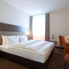 Отель IntercityHotel Berlin - Brandenburg Airport Германия, Шёнефельд - 2 отзыва об отеле, цены и фото номеров - забронировать отель IntercityHotel Berlin - Brandenburg Airport онлайн комната для гостей фото 5