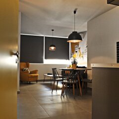 Апартаменты The Athenians Modern Apartments питание