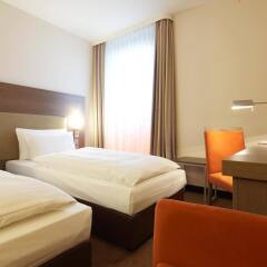 Отель IntercityHotel Berlin - Brandenburg Airport Германия, Шёнефельд - 2 отзыва об отеле, цены и фото номеров - забронировать отель IntercityHotel Berlin - Brandenburg Airport онлайн удобства в номере фото 2