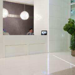Отель Nassima Tower Hotel Apartments ОАЭ, Дубай - отзывы, цены и фото номеров - забронировать отель Nassima Tower Hotel Apartments онлайн интерьер отеля фото 3