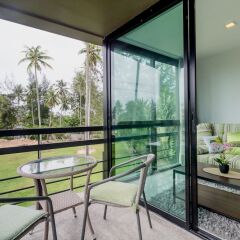Отель The Kris Resort Condotel at Bagtao Beach пляж Банг-Тао балкон