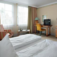 Отель Golden Tulip Olymp Германия, Эхинг - отзывы, цены и фото номеров - забронировать отель Golden Tulip Olymp онлайн комната для гостей фото 2
