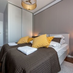 Апартаменты WarsawLiving - Cybernetyki Apartments комната для гостей фото 5