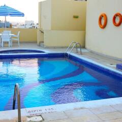 Xclusive Casa Hotel Apartments бассейн