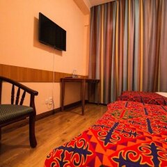 Отель Tagaitai Guest House Кыргызстан, Каракол - отзывы, цены и фото номеров - забронировать отель Tagaitai Guest House онлайн удобства в номере