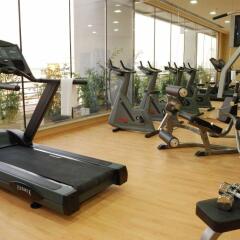 Отель MENA ApartHotel Albarsha фитнесс-зал