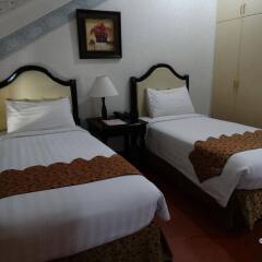 Отель White Knight Hotel Intramuros Филиппины, Манила - 3 отзыва об отеле, цены и фото номеров - забронировать отель White Knight Hotel Intramuros онлайн комната для гостей фото 4