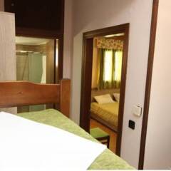 Ariadni Hotel Bungalows комната для гостей