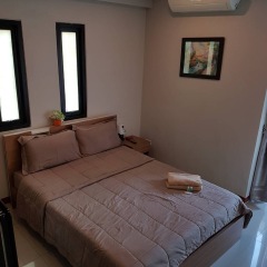 Апартаменты Atchara Service Apartment комната для гостей фото 5