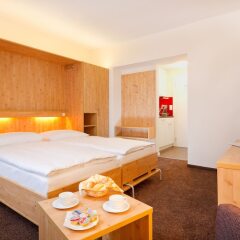 Отель Central Swiss Quality Apartments Швейцария, Давос - отзывы, цены и фото номеров - забронировать отель Central Swiss Quality Apartments онлайн комната для гостей фото 4