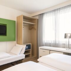 Отель NH Berlin Potsdamer Platz Германия, Берлин - 1 отзыв об отеле, цены и фото номеров - забронировать отель NH Berlin Potsdamer Platz онлайн комната для гостей фото 2