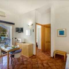 Отель Hibiscus Hotel Residence Италия, Синискола - отзывы, цены и фото номеров - забронировать отель Hibiscus Hotel Residence онлайн комната для гостей фото 5