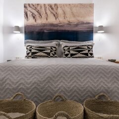 Отель 3 Caves Villa by Caldera Houses Греция, Остров Санторини - отзывы, цены и фото номеров - забронировать отель 3 Caves Villa by Caldera Houses онлайн комната для гостей