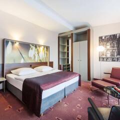 AZIMUT Hotel Cologne комната для гостей