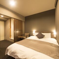 Отель Dormy Inn Toyama Natural Hot Spring Тояма комната для гостей