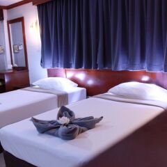 Отель The Little Mermaid Guesthouse And Restaurant пляж Ката комната для гостей фото 4