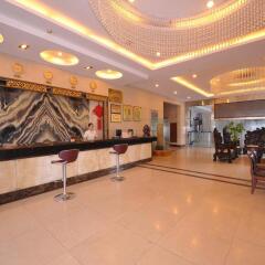 Xingan Zelin Hotel интерьер отеля