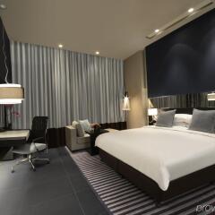 Отель The Boulevard Arjaan by Rotana комната для гостей