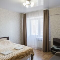 Гостиница Comfort Apartment on Stroitelny per 8 в Иркутске отзывы, цены и фото номеров - забронировать гостиницу Comfort Apartment on Stroitelny per 8 онлайн Иркутск комната для гостей фото 2