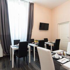 Отель Arch Rome Suites в номере