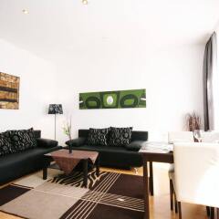 Отель Vienna CityApartments - Premium Apartment Vienna 1 Австрия, Вена - отзывы, цены и фото номеров - забронировать отель Vienna CityApartments - Premium Apartment Vienna 1 онлайн комната для гостей фото 3