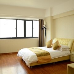 Отель Sweetome Vacation Rentals Wanda Plaza Китай, Сямынь - отзывы, цены и фото номеров - забронировать отель Sweetome Vacation Rentals Wanda Plaza онлайн комната для гостей фото 5