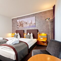 Отель Ramada by Wyndham Dresden Германия, Дрезден - 1 отзыв об отеле, цены и фото номеров - забронировать отель Ramada by Wyndham Dresden онлайн комната для гостей фото 5
