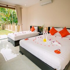 Отель New Sunshine Homestay сейф в номере