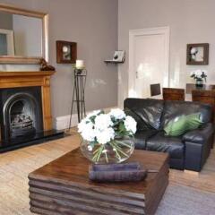 Апартаменты Greyfriars Apartments - Parliament Square Эдинбург комната для гостей фото 4