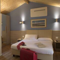 Отель Paradú Resort Toscana Кастаньето-Кардуччи комната для гостей фото 3
