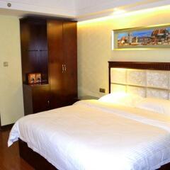 Отель GreenTree Inn International Convention Center комната для гостей