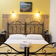 Отель B&B Le Cinque Novelle Агридженто сейф в номере