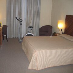 Отель MH Hotel Piacenza Fiera Италия, Пьяченца - отзывы, цены и фото номеров - забронировать отель MH Hotel Piacenza Fiera онлайн комната для гостей фото 5