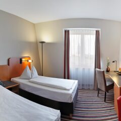 Отель Ramada Leipzig City Centre (ex.tulip Inn) Лейпциг комната для гостей