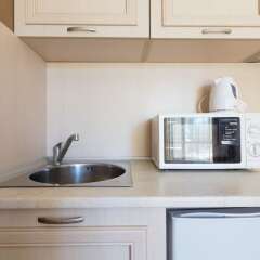 Апартаменты Cosy Studio with Kitchen & Balcony в номере