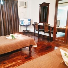 Отель MC Mountain Home Apartelle Филиппины, Тагайтай - отзывы, цены и фото номеров - забронировать отель MC Mountain Home Apartelle онлайн удобства в номере