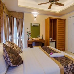 Отель The Sand Gate Inn Мале комната для гостей