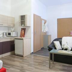 Апартаменты Queens Apartments комната для гостей фото 3