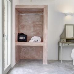 Отель Desiterra Suites and Villas сейф в номере