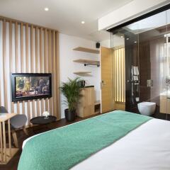 Отель Dominic Smart & Luxury Suites Parliament комната для гостей фото 3