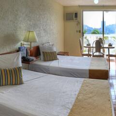 Отель Alba Suites Acapulco комната для гостей