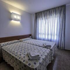 Отель Apartamentos Los Juncos Испания, Ла Пинеда - отзывы, цены и фото номеров - забронировать отель Apartamentos Los Juncos онлайн комната для гостей фото 3