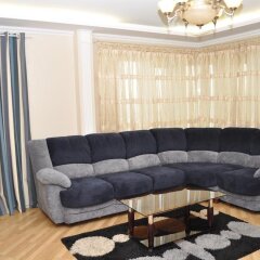 Гостиница Posutochno Apartments 1905 Goda в Москве отзывы, цены и фото номеров - забронировать гостиницу Posutochno Apartments 1905 Goda онлайн Москва комната для гостей фото 3