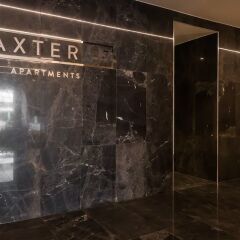 Апартаменты Baxter Street Apartments гостиничный бар