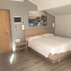 GH Hotel Monzoni Долина Валь-ди-Фасса сейф в номере